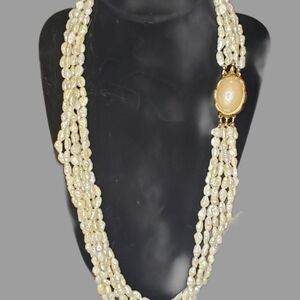 Elegant Multi-Strand Pearl Necklace with Gold Accent